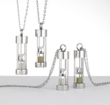 hourglass pendants with green and white diamond dust
