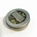 Think of When You Had None money clip in its round tin packed with shredded U.S. currency